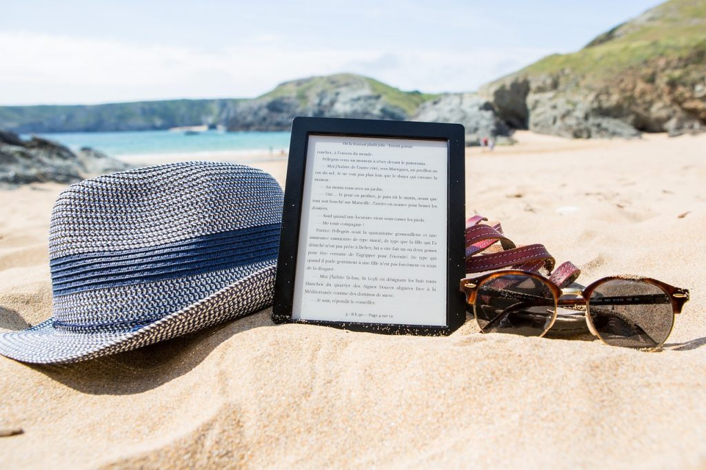 ebook, hat, sunglasses-3544077.jpg