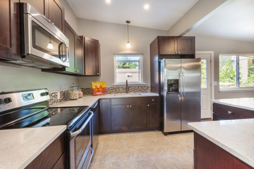 kitchen, dark cabinets, dark cabinetry, stainless steel appliances, tile, quartz counter, lighting, brown kitchen, brown dark, kitchen, kitchen, kitchen, kitchen, kitchen-3564506.jpg